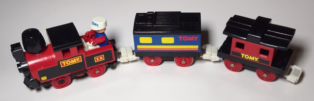 1995 chuffing_car doll north_america tomy tomytrain toy train tunnel_sound_train_set // 5049x1626 // 1.6MB